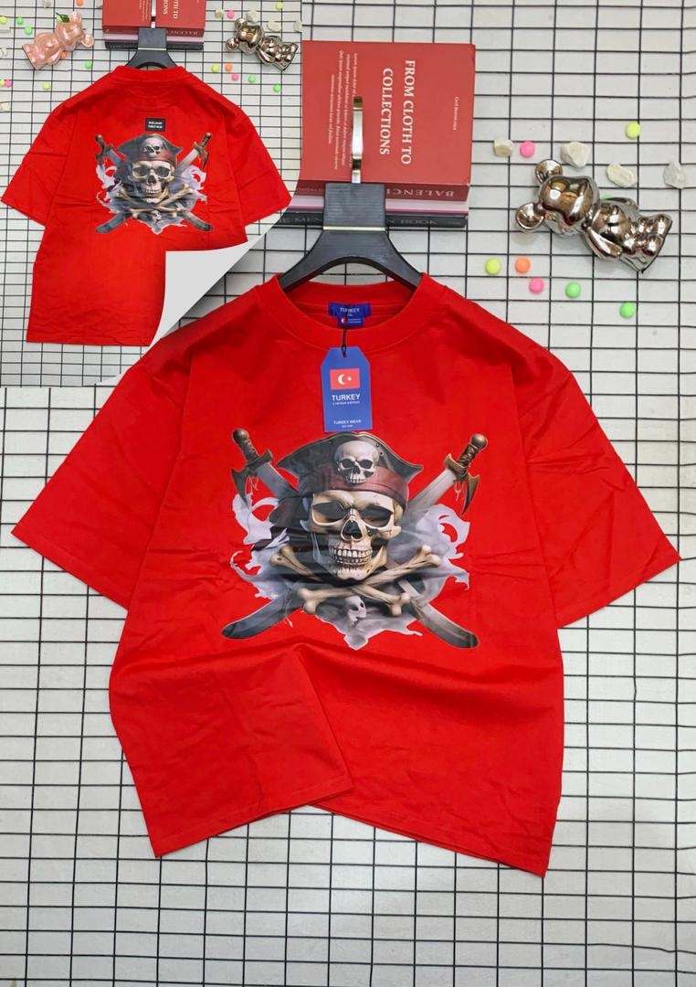 Red oversized t-shirt with pirate skull and crossed swords graphic on front and back.