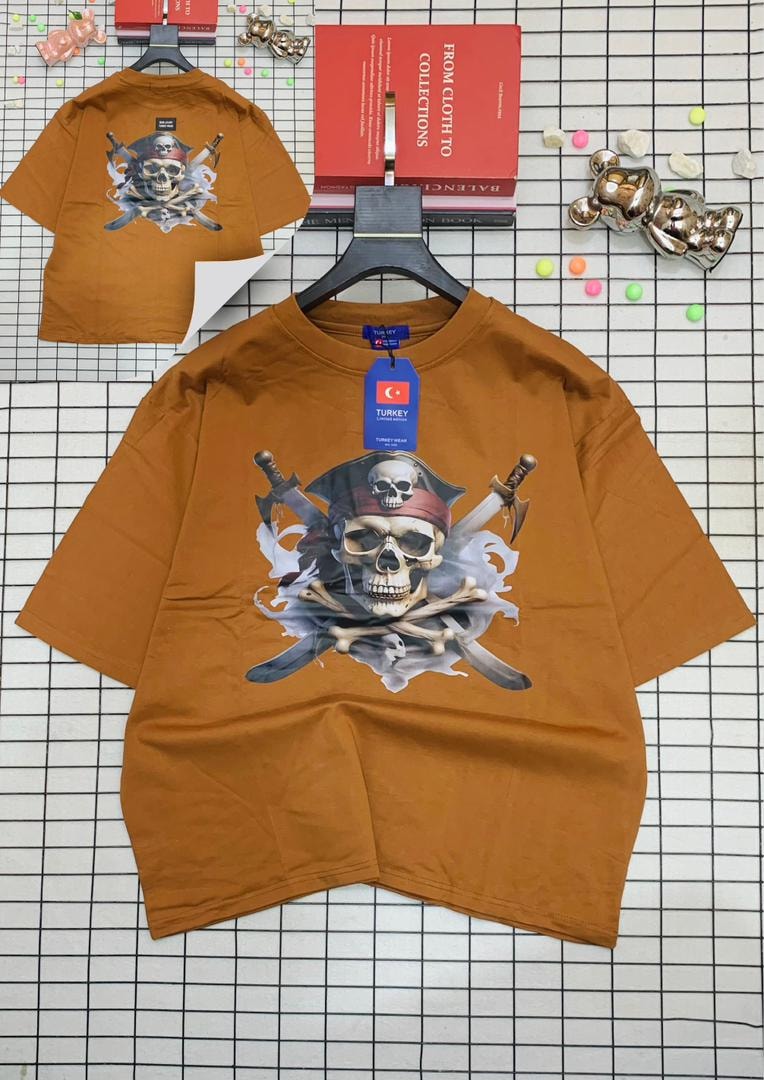 Orange oversized t-shirt with pirate skull and crossed swords graphic on front and back.