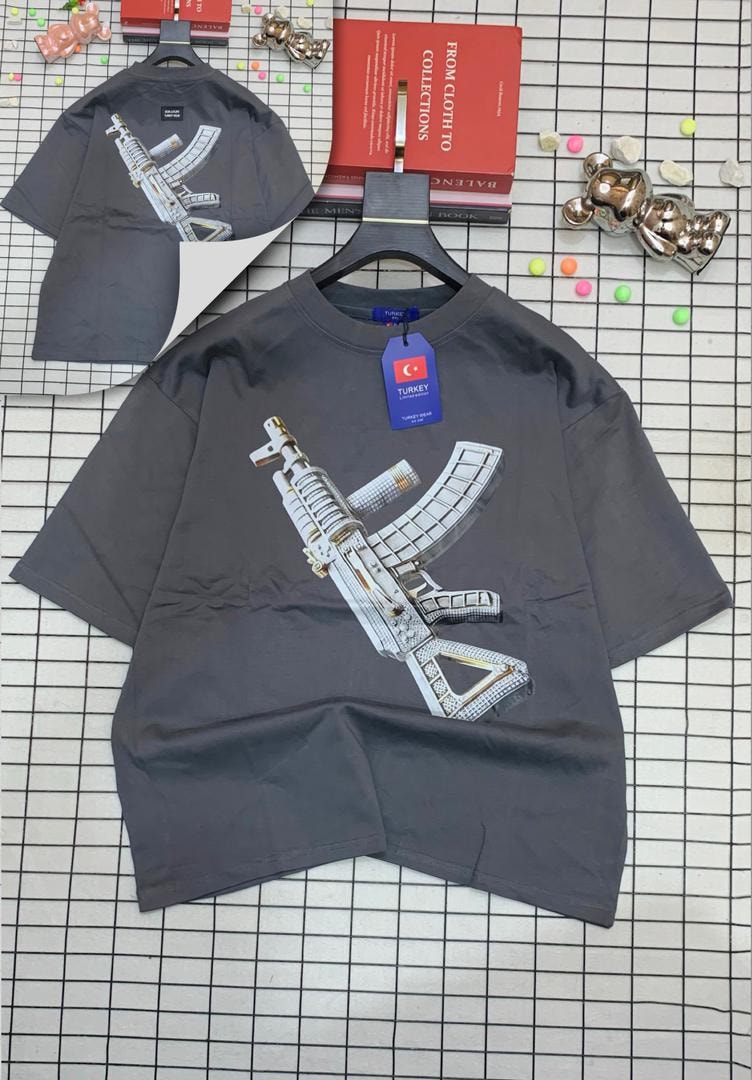 Gray oversized t-shirt with jeweled AK-47 graphic on front and back.