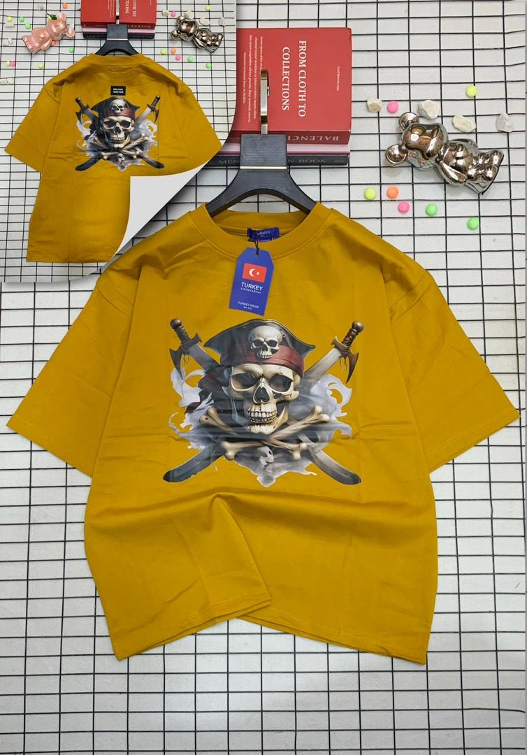 Yellow oversized t-shirt with pirate skull and crossed swords graphic on front and back.