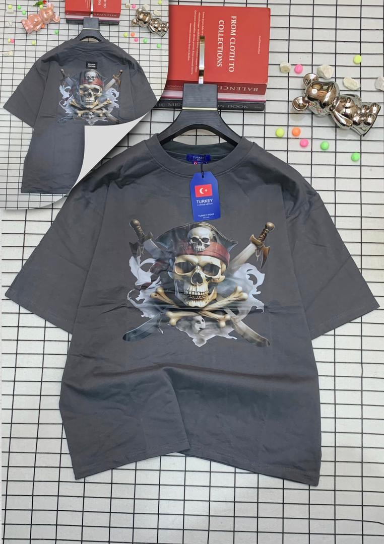 Gray oversized t-shirt with pirate skull and crossed swords graphic on front and back.