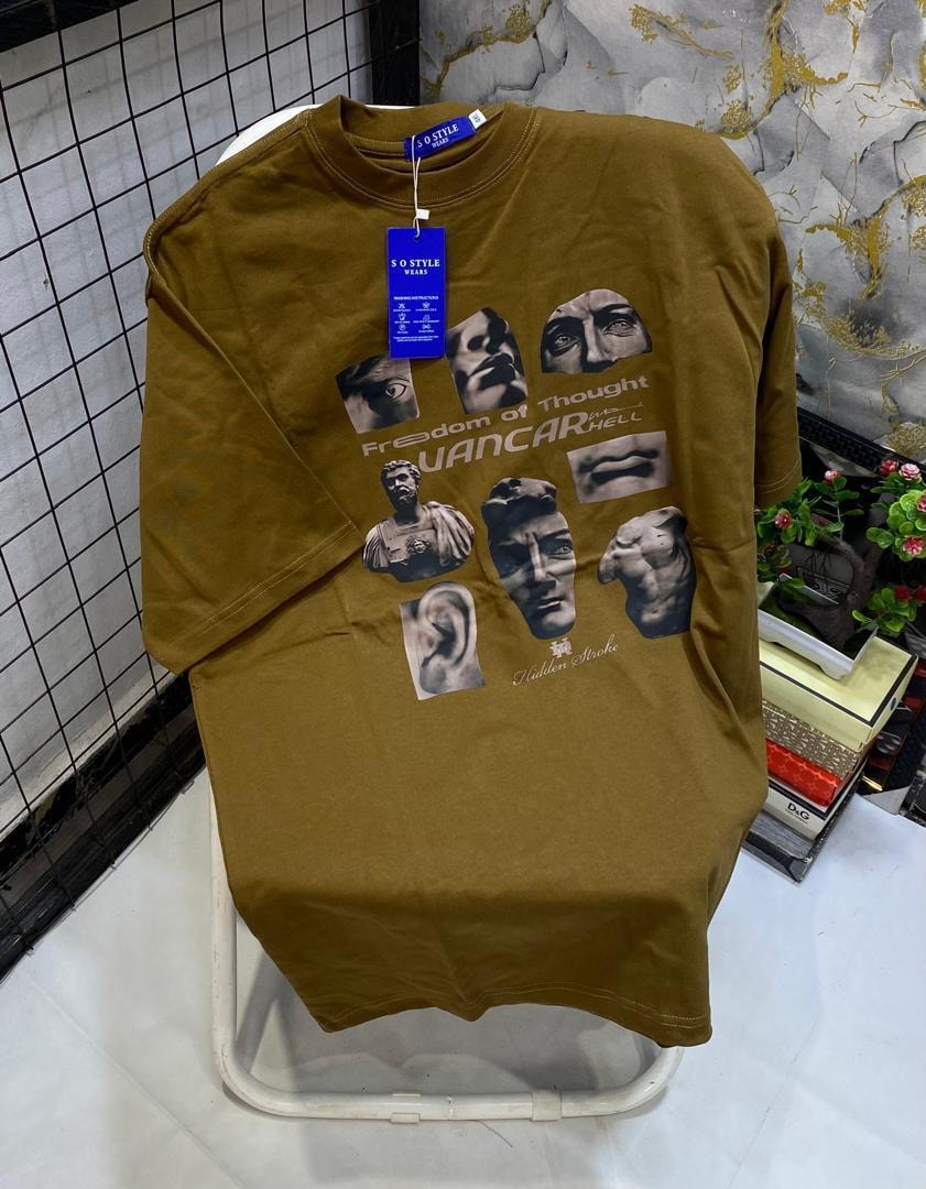 Olive t-shirt with collage of faces, statues and text elements.