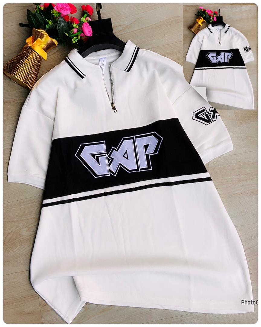 White GAP logo quarter zip collared polo shirt laid flat with inset view.