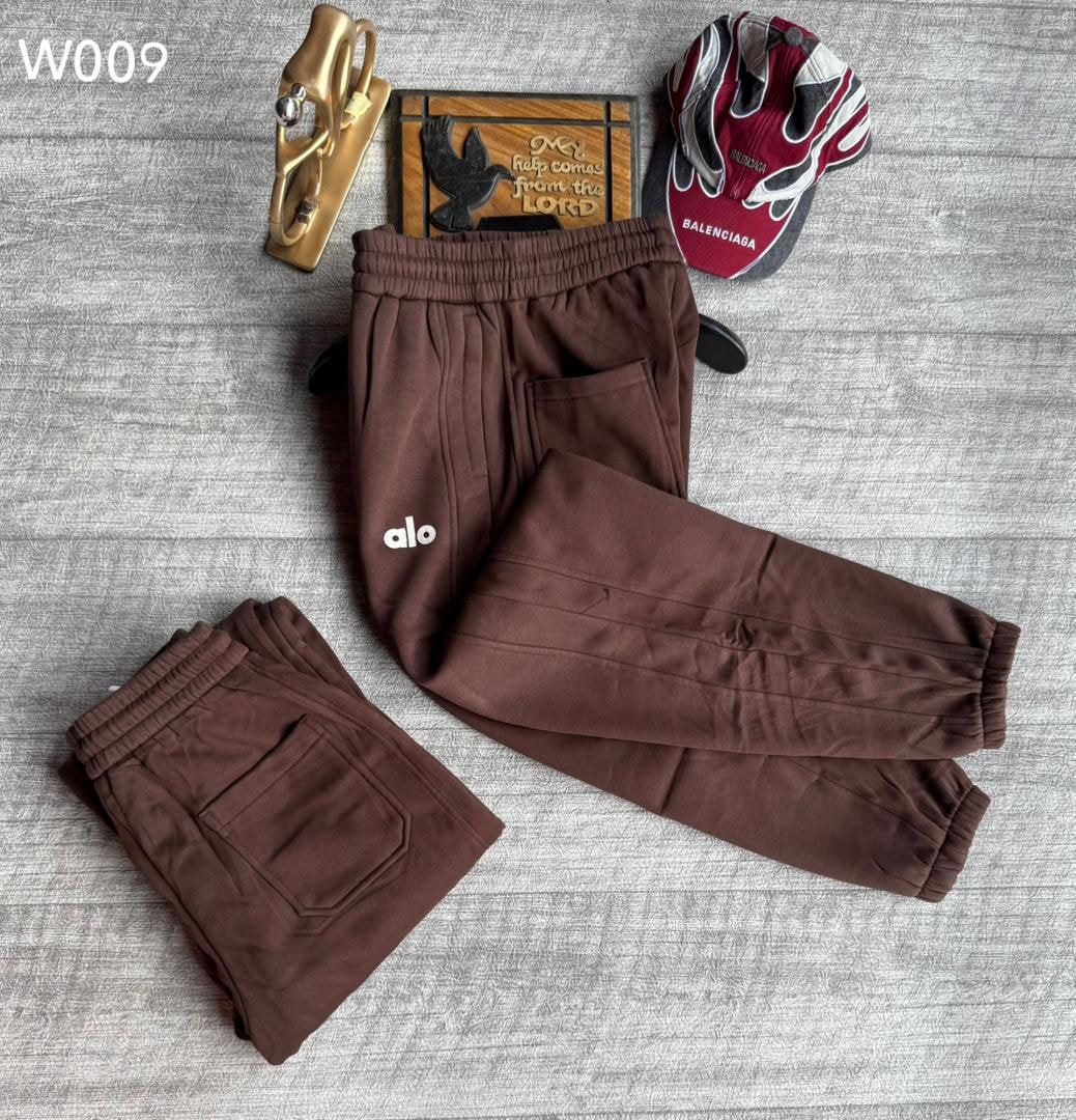 Brown ALO joggers with front and back views, displaying logo and pocket details.