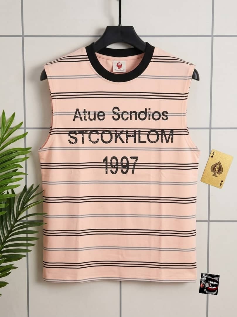 Peach and gray striped sleeveless top with Atue Scndios Stockholm 1997 chest print.