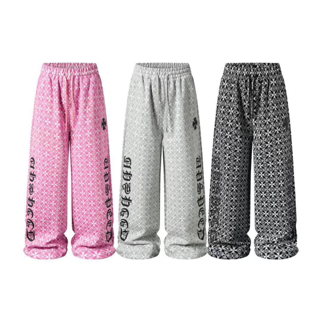 Three patterned joggers in pink, gray, and black with all-over geometric design and side prints shown side by side.