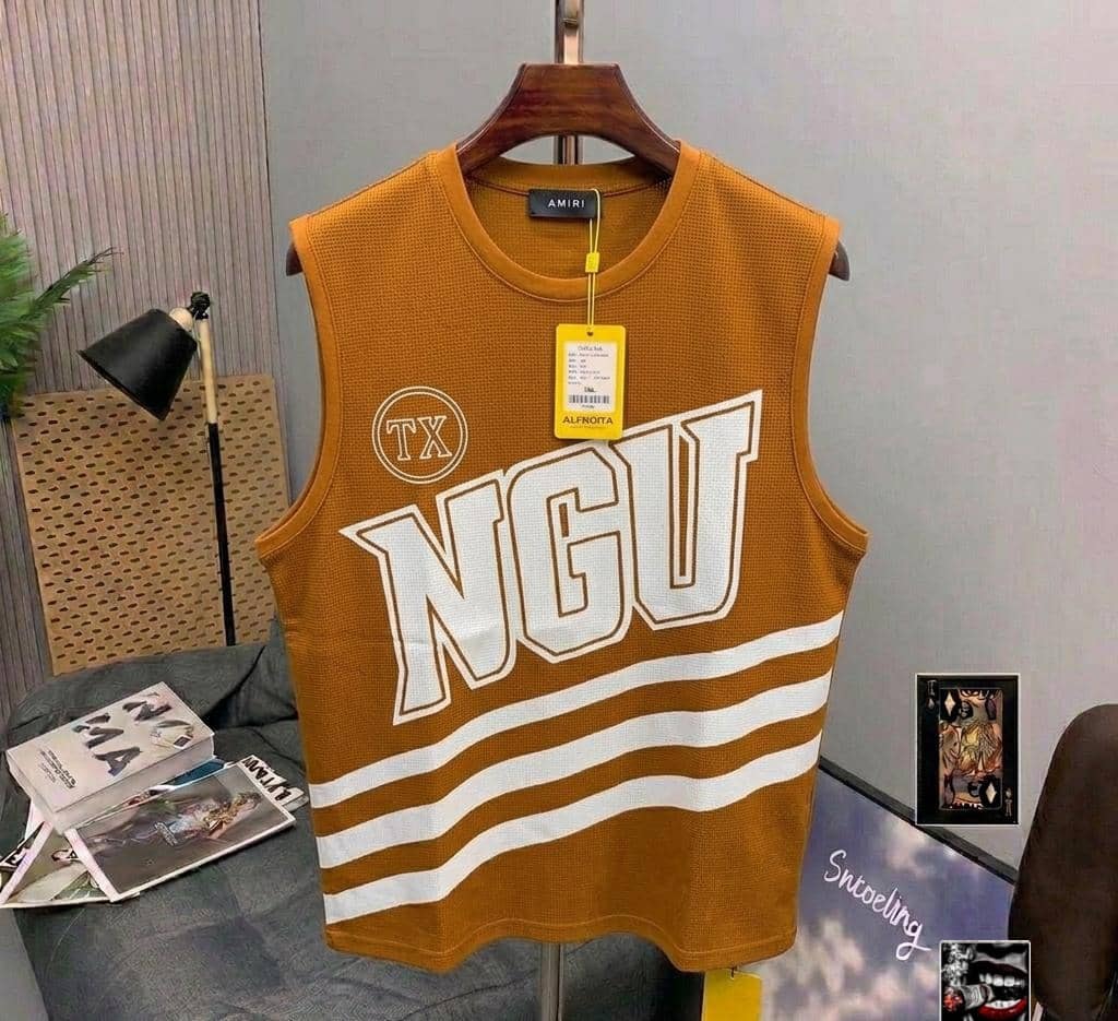 Front view of brown NGU graphic armless top on hanger.
