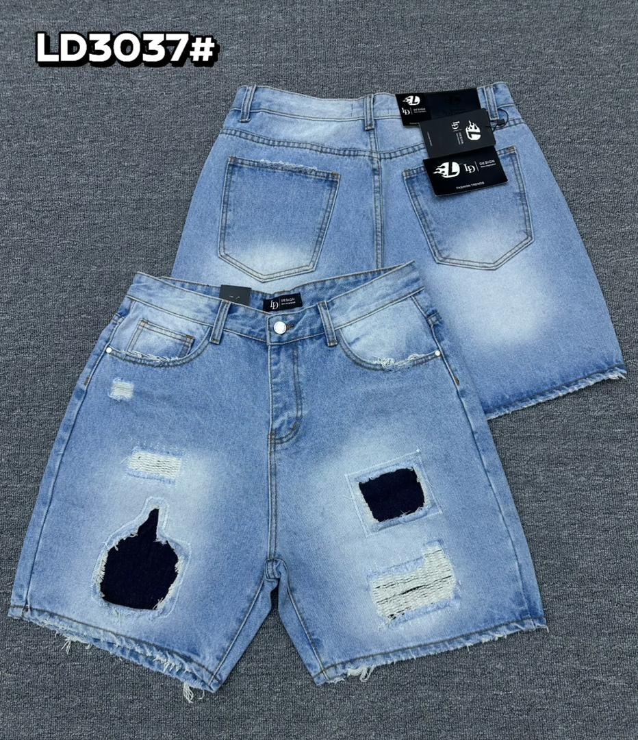 Light blue denim jorts with rips, patches and distressing, front and back views.