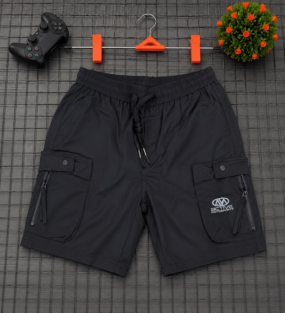 Black cargo shorts with Active Motorsports logo on grid.
