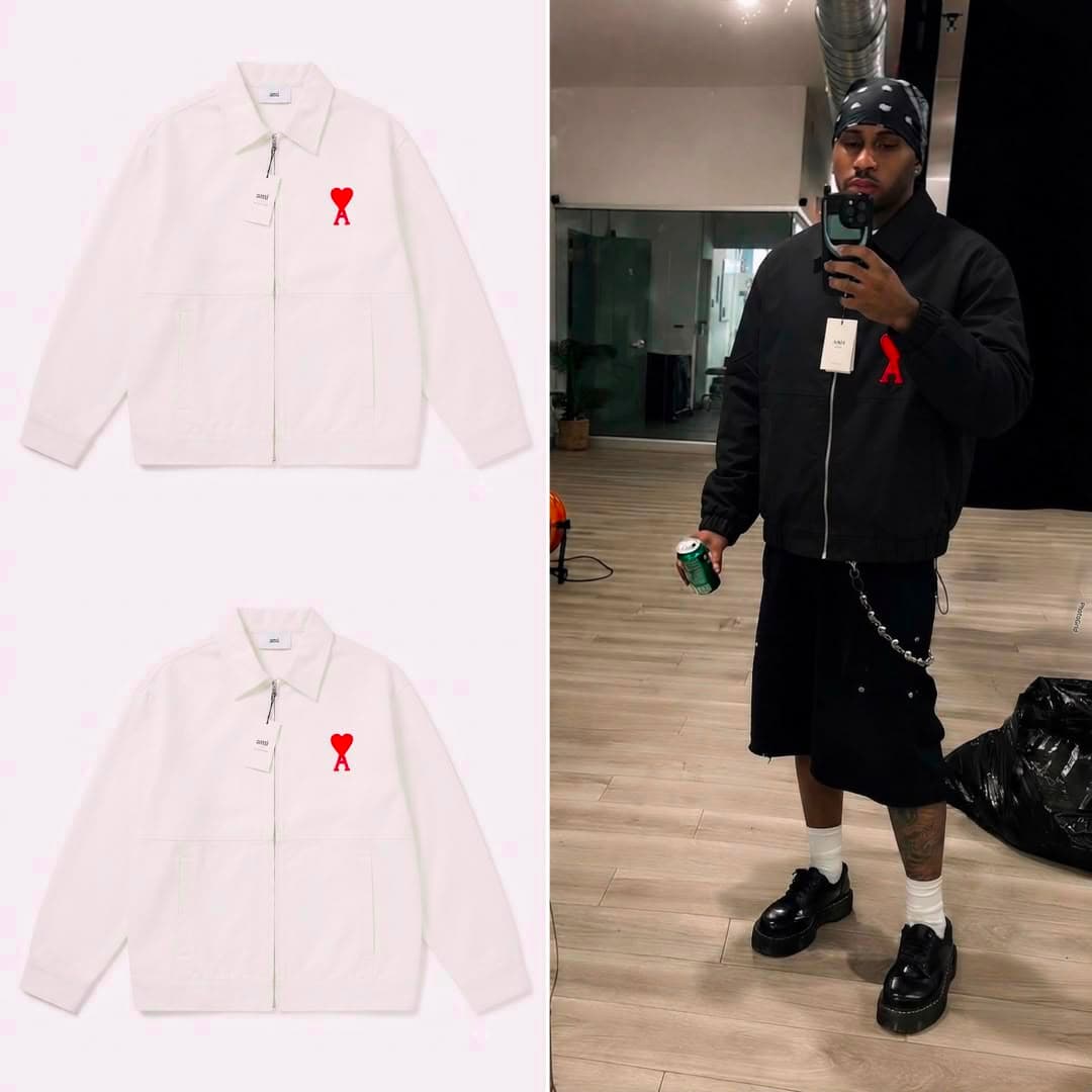 White AMI heart logo zip-up jacket in flat lay with model wearing black colorway.