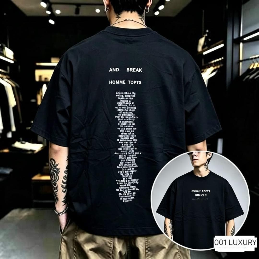Man from back in black oversized t-shirt with extensive white text print covering the back.