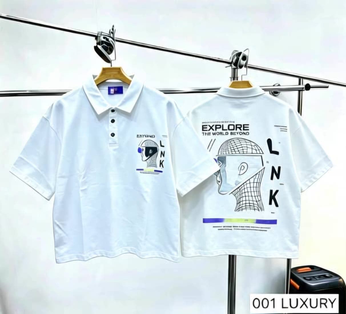 White polo shirt with helmet graphic and explore text, front and back views.