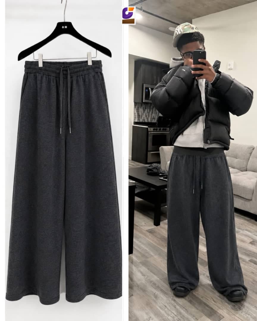Dark gray flare joggers on hanger and worn by male model indoors with logo overlay.