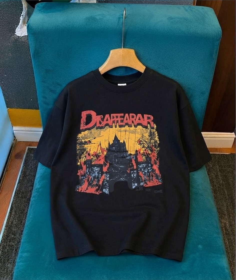 Black short sleeve t-shirt with Disappear castle graphic.
