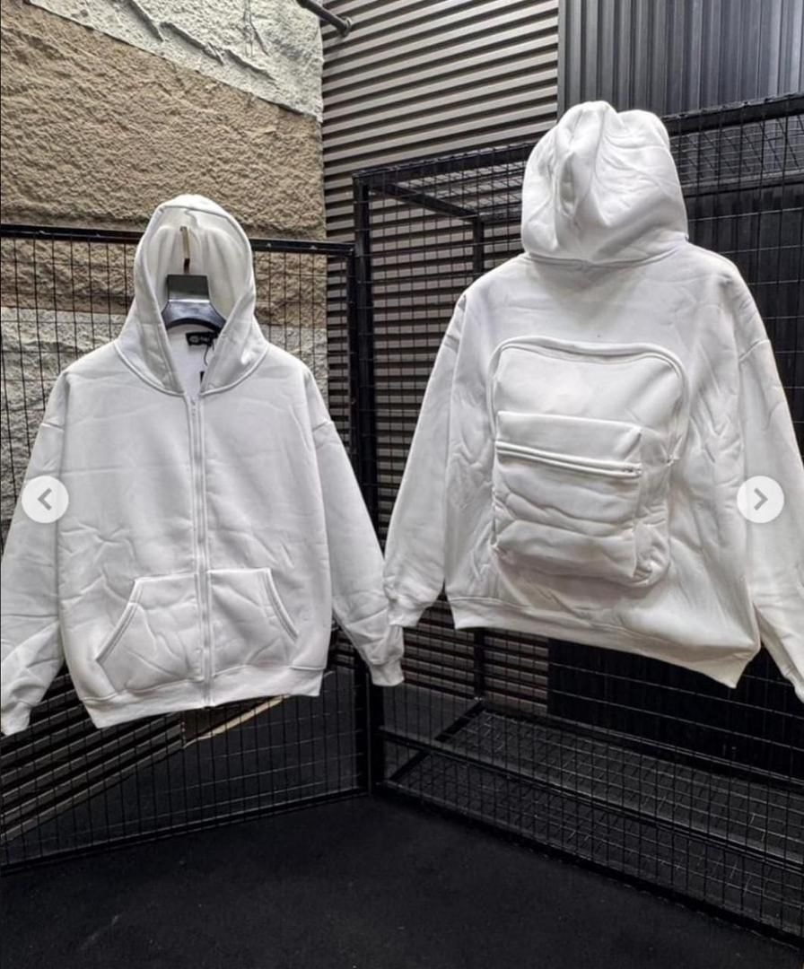 White zip-up hoodie shown from front with kangaroo pocket and back with large quilted utility pocket.