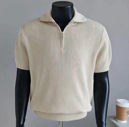 Cream ribbed quarter-zip polo shirt on mannequin.