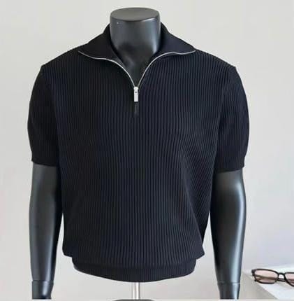 Black ribbed quarter-zip polo shirt on mannequin.