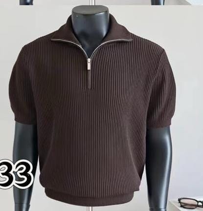 Brown ribbed quarter-zip polo shirt on mannequin.