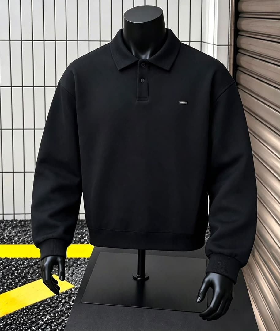Black long sleeve polo sweatshirt on black mannequin.