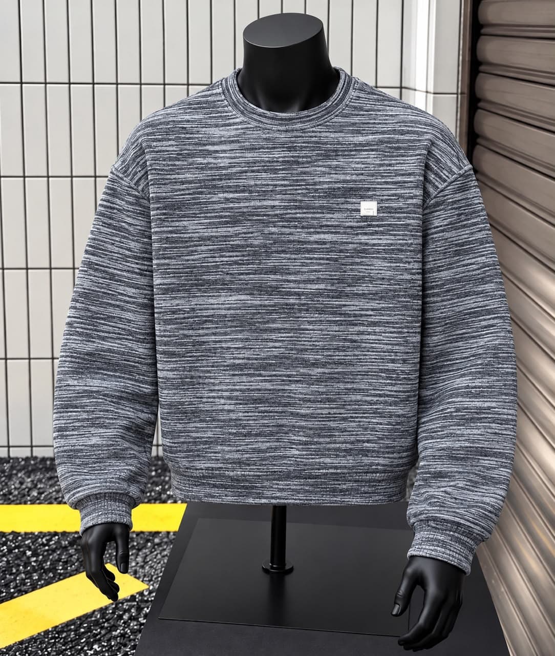 Dark gray marled sweatshirt on mannequin.