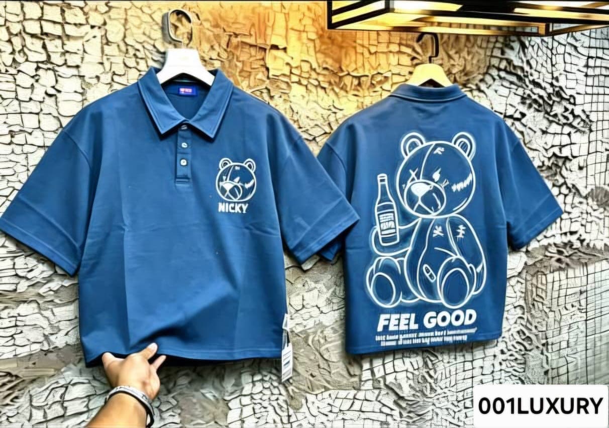 Blue polo shirt with teddy bear Nicky design shown in front and back views.