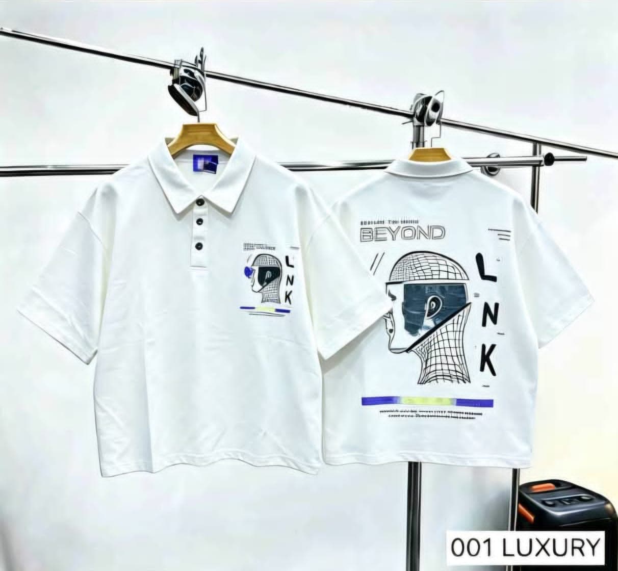 White polo shirt featuring LINK helmet graphic on chest and detailed back print.