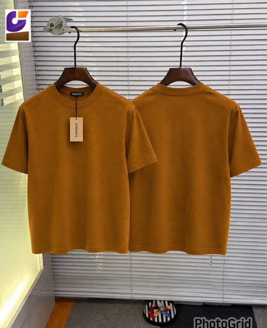 Tan plain t-shirt shown from front and back on hangers.