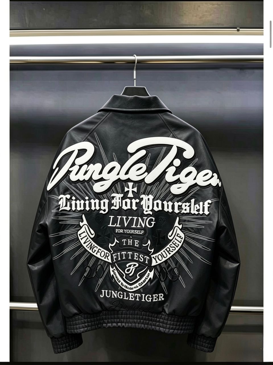 Back view of black JungleTiger leather bomber jacket with full graphic embroidery.