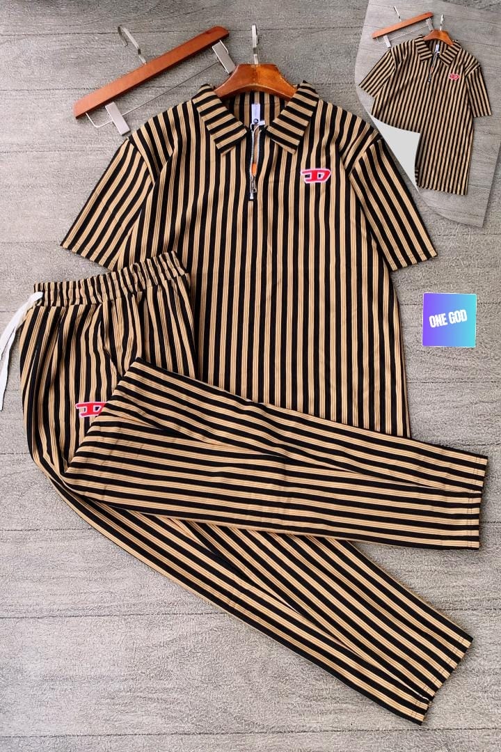 Tan and black striped ribbed two-piece set with red logo on polo top and pants.