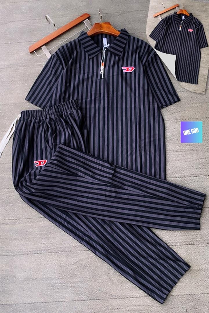 Black and gray striped ribbed two-piece set with red logo on polo top and pants.