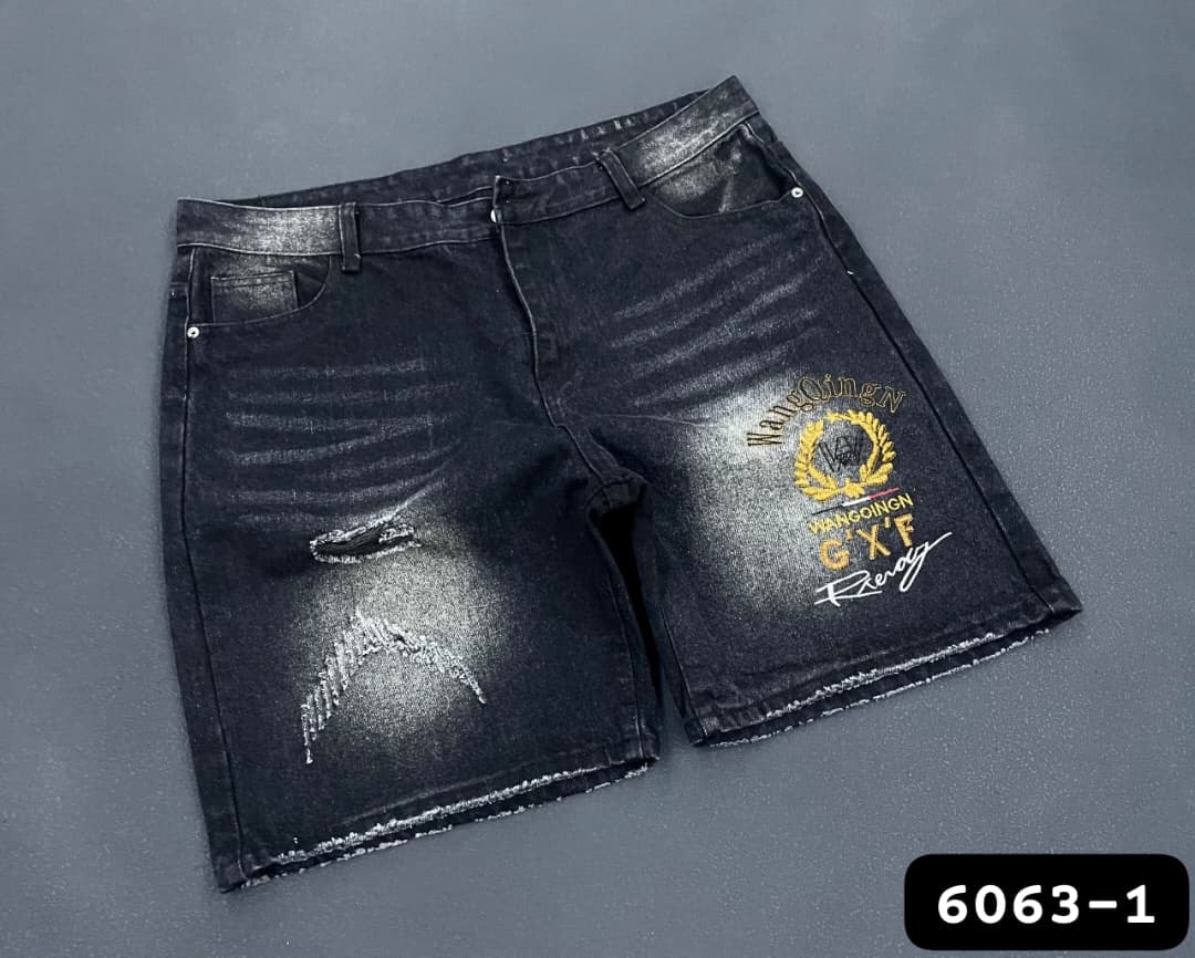Black washed denim shorts with gold WangQingN and G'X'F embroidery plus rips.