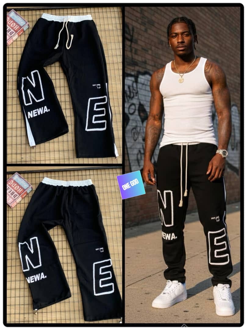 Black NEWA letter graphic joggers in flat lay and on model.