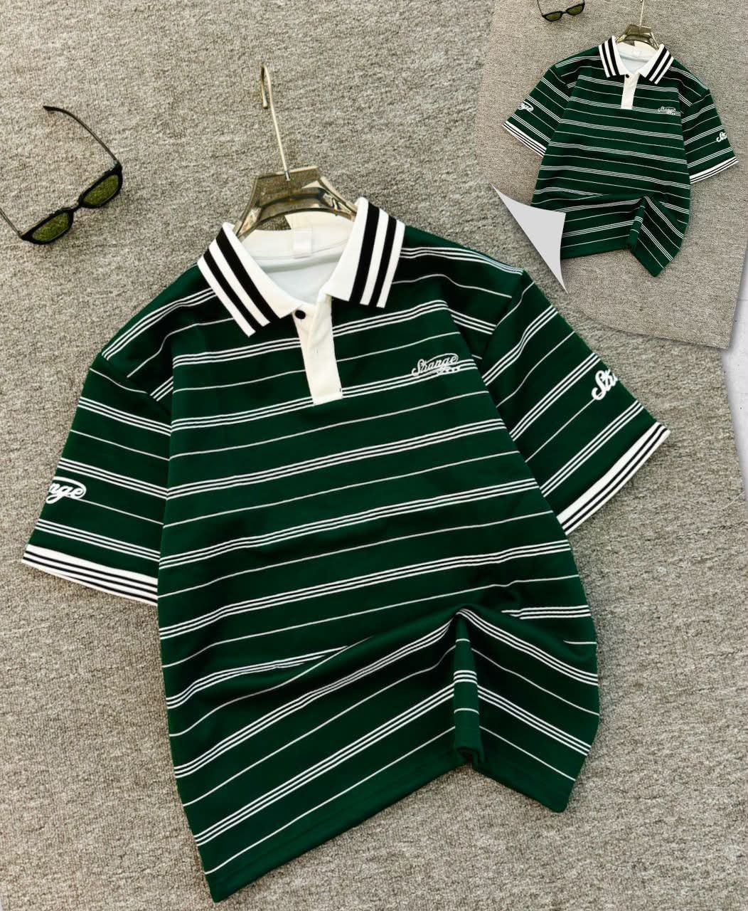 Green striped polo shirt with white horizontal stripes, contrast collar and embroidered details.