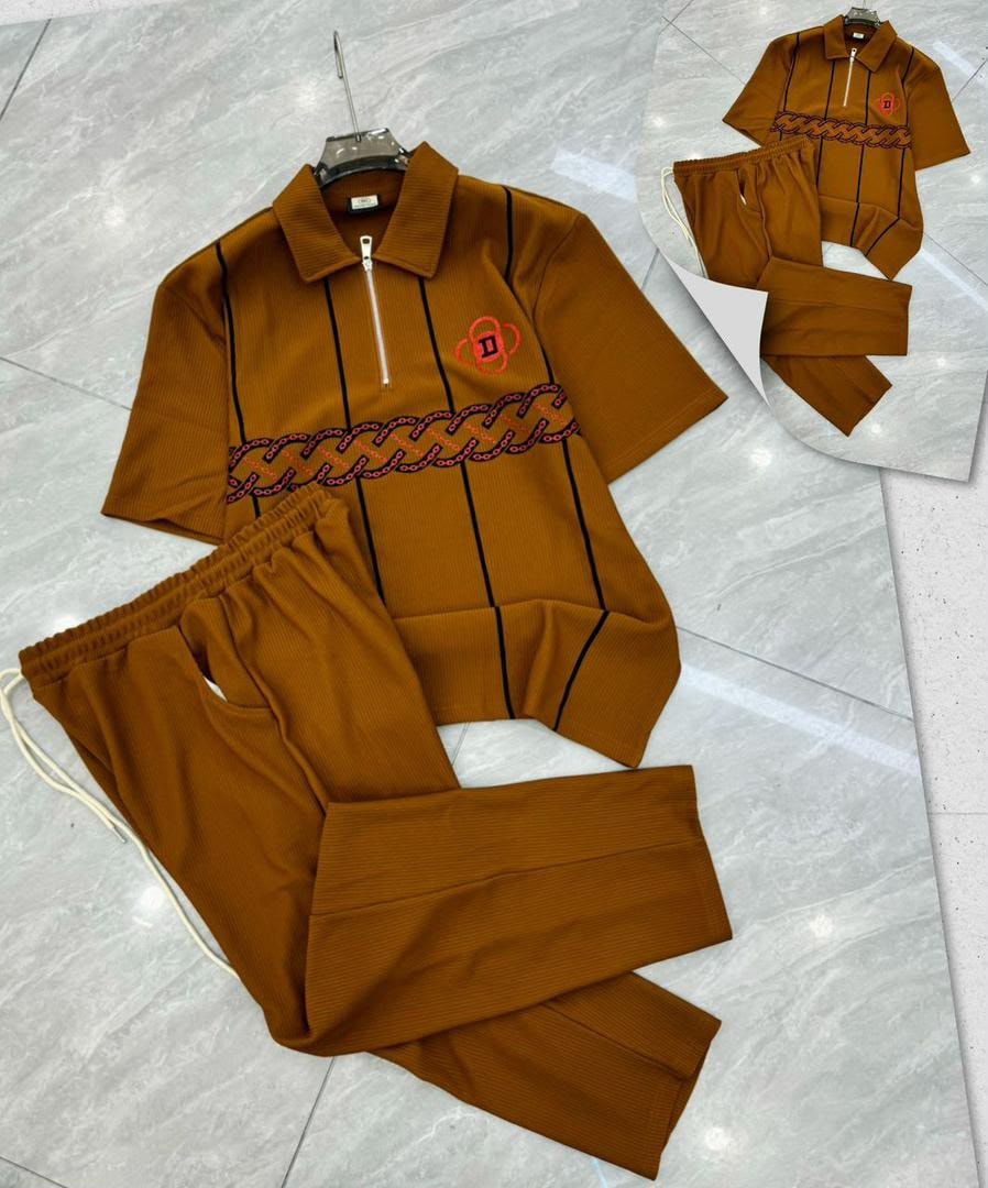 Brown ribbed polo and jogger two-piece set with chain embroidery.
