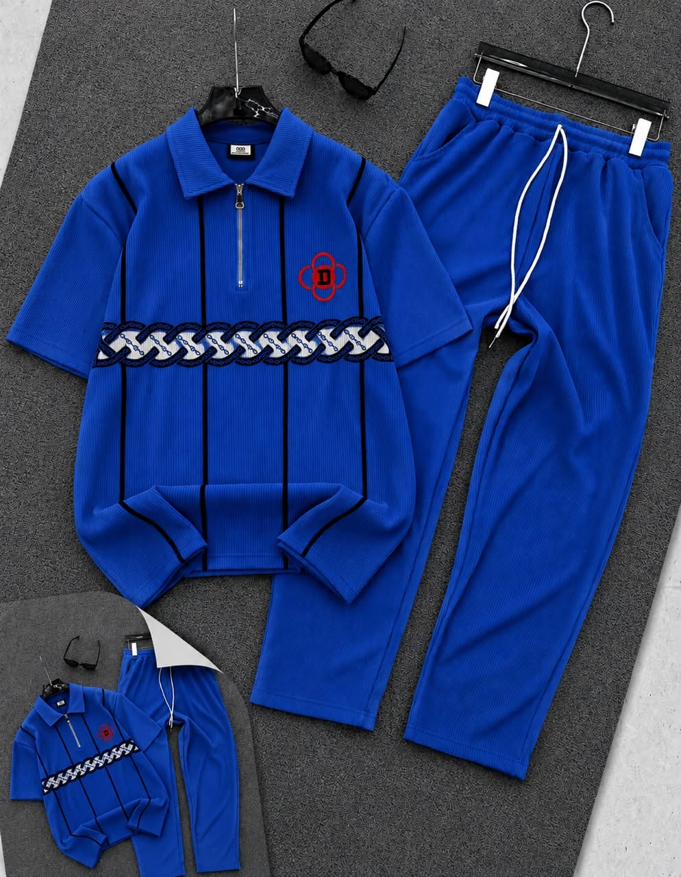 Blue ribbed polo and jogger two-piece set with chain embroidery.