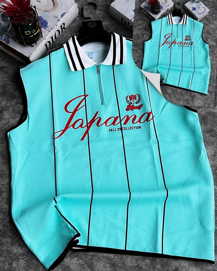 Light blue striped armless top with Japana script and fall collection details.