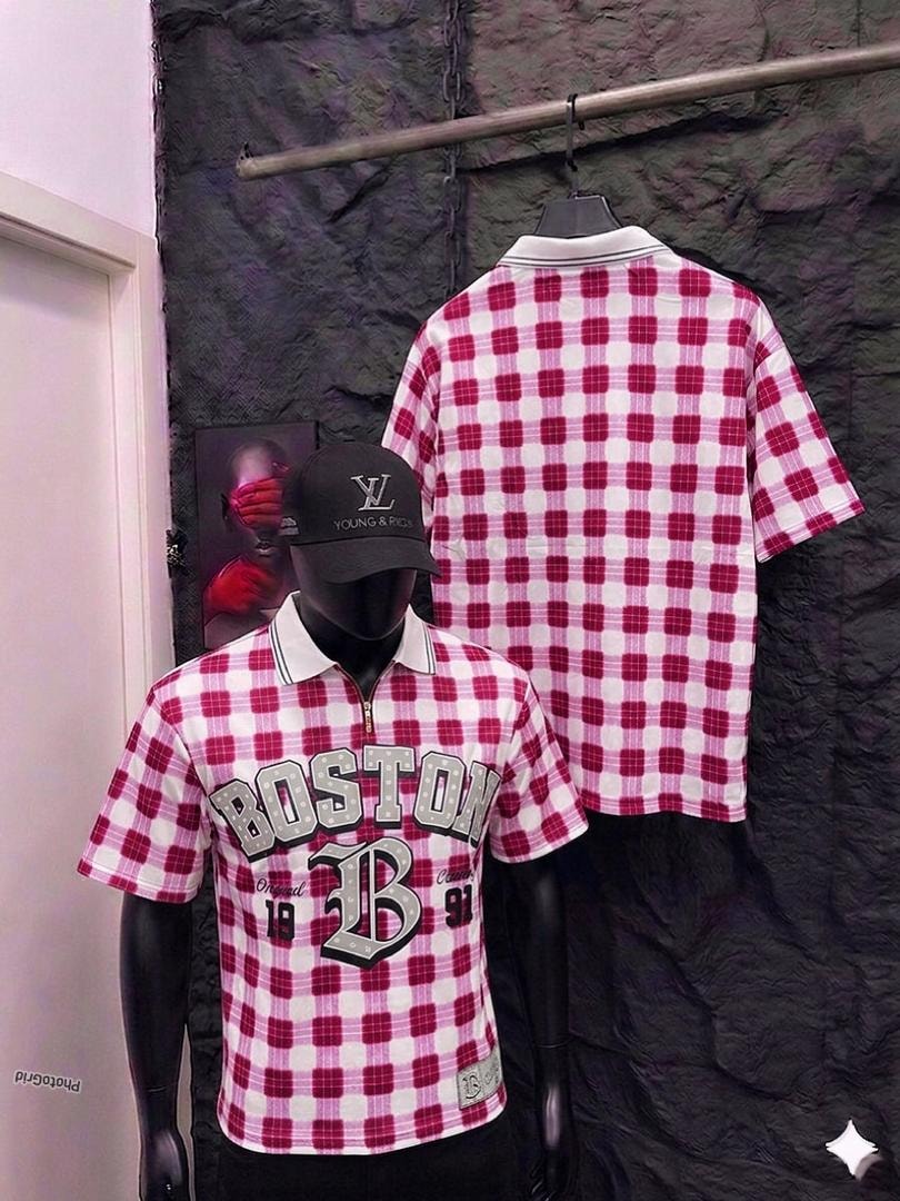 Mannequin in red plaid polo shirt with Boston graphic, back view hanging on rack.