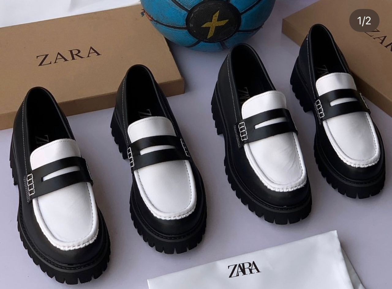 Multiple views of black and white Zara platform loafers with branding boxes and accessories.