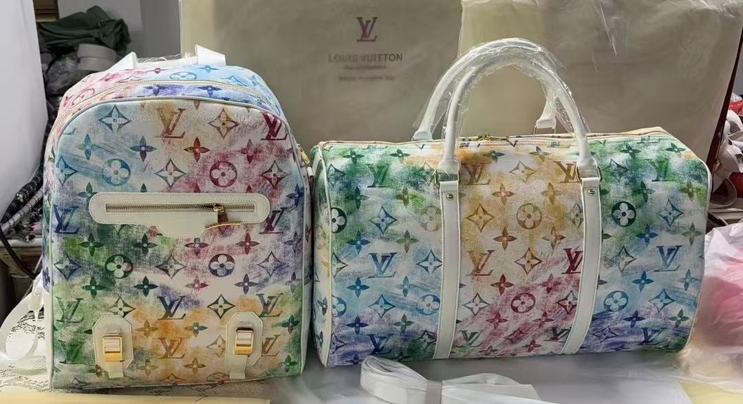Rainbow watercolor LV monogram backpack and duffle bag set.