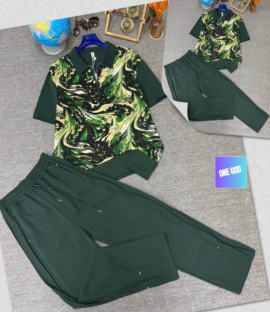 Green two-piece set with green and yellow marble print polo shirt and green trousers.