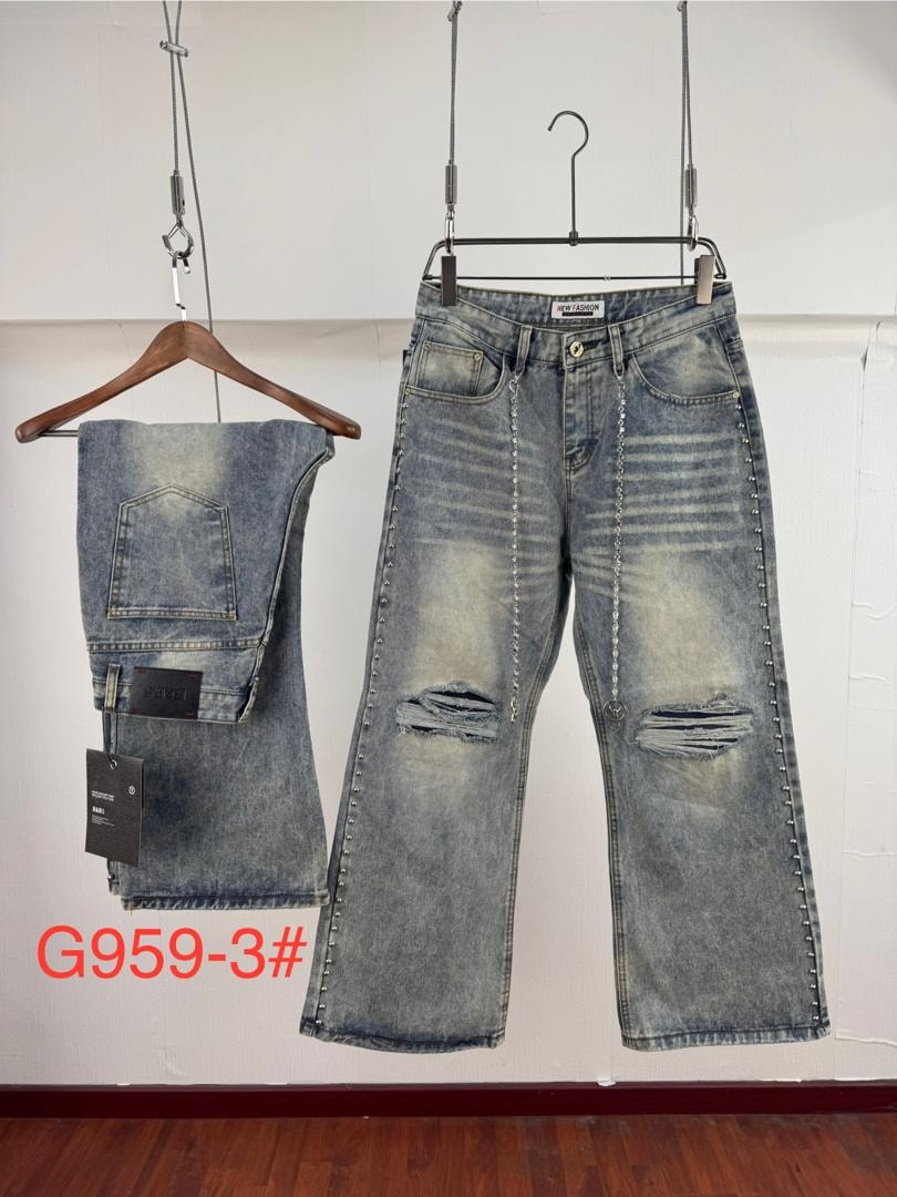 Light blue jeans with knee rips, side studs, chain and folded pair displayed.
