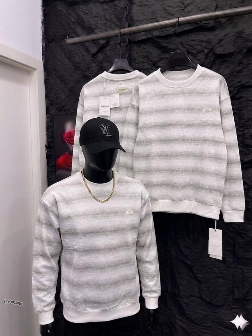 Light gray striped sweatshirt on mannequin and hanger with tags.