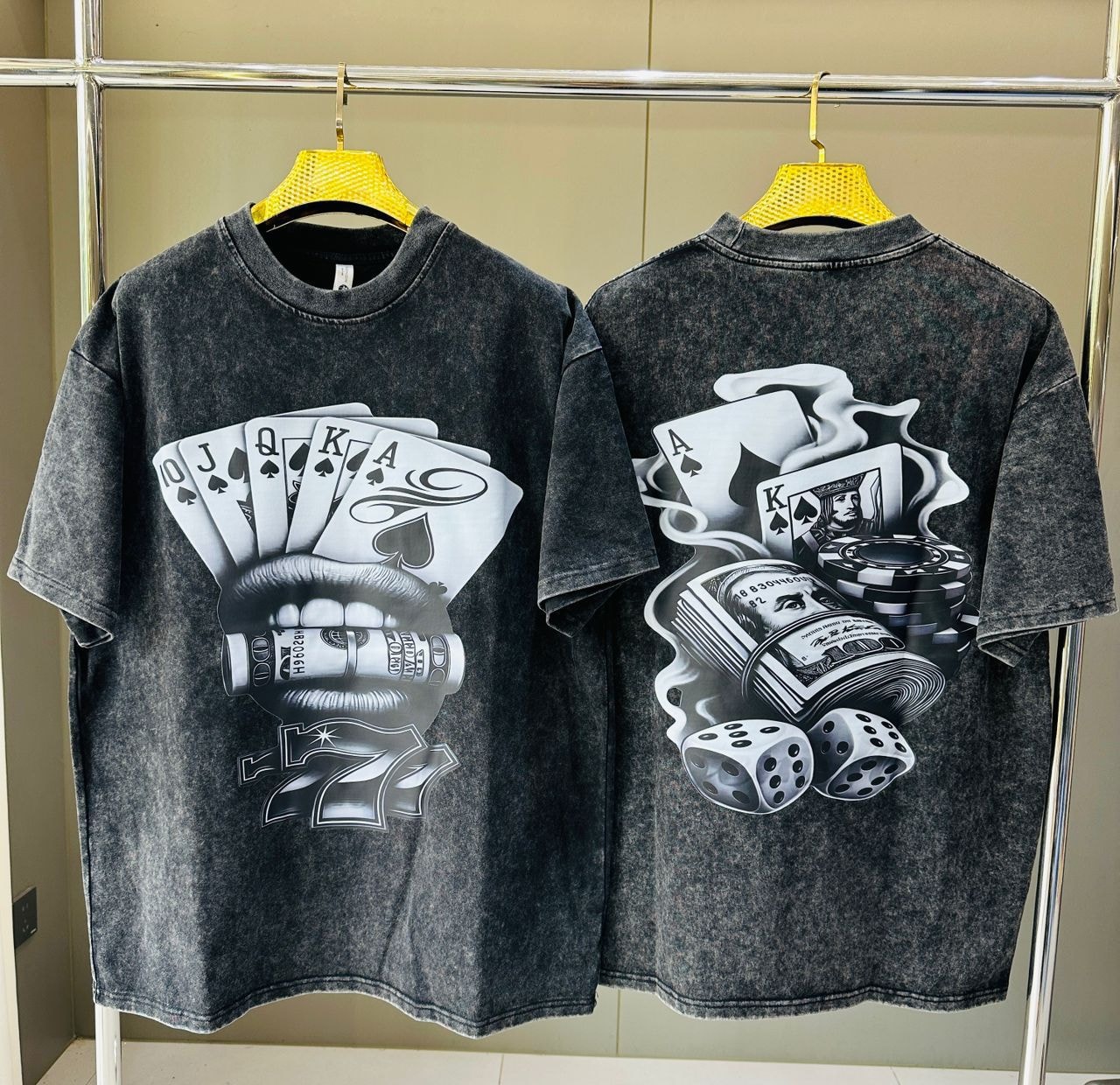 Stone wash t-shirt with playing cards lips and 777 on front, poker chips and cards on back.