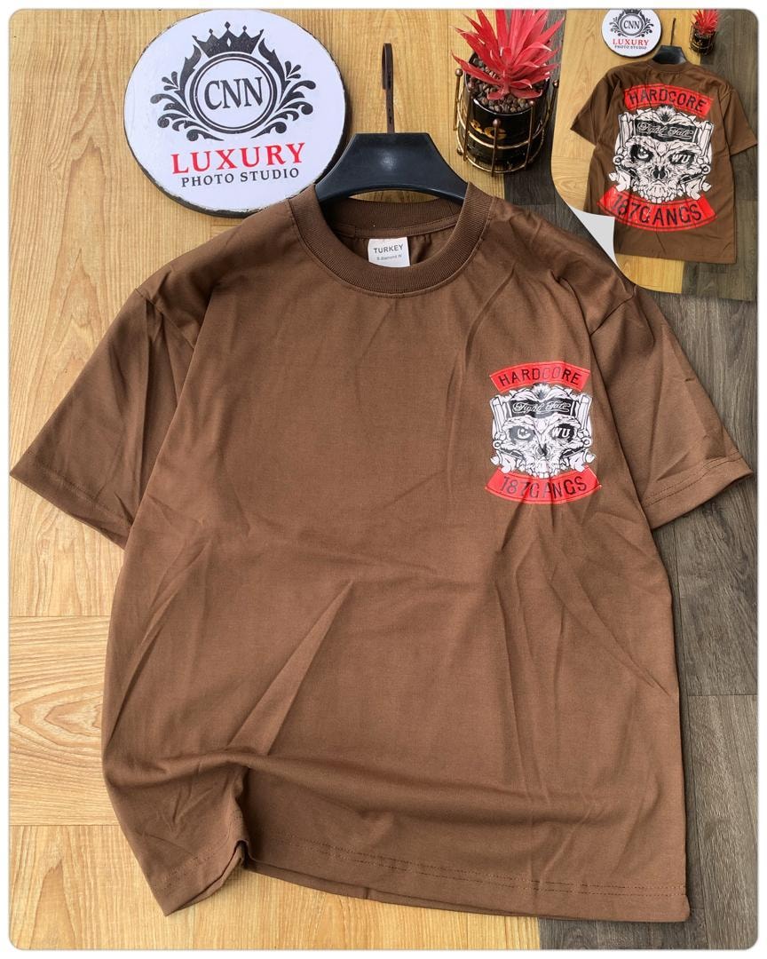 Brown t-shirt with hardcore skull and 187 GANGS graphic on chest.