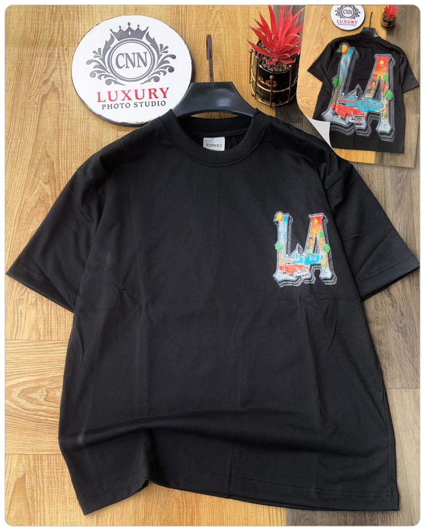 Black round neck t-shirt with LA graphic on chest, inset showing back with full LA design.