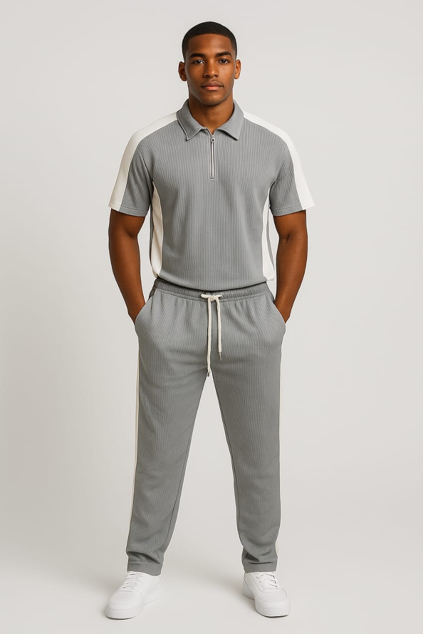 Man modeling gray ribbed polo shirt and jogger pants.