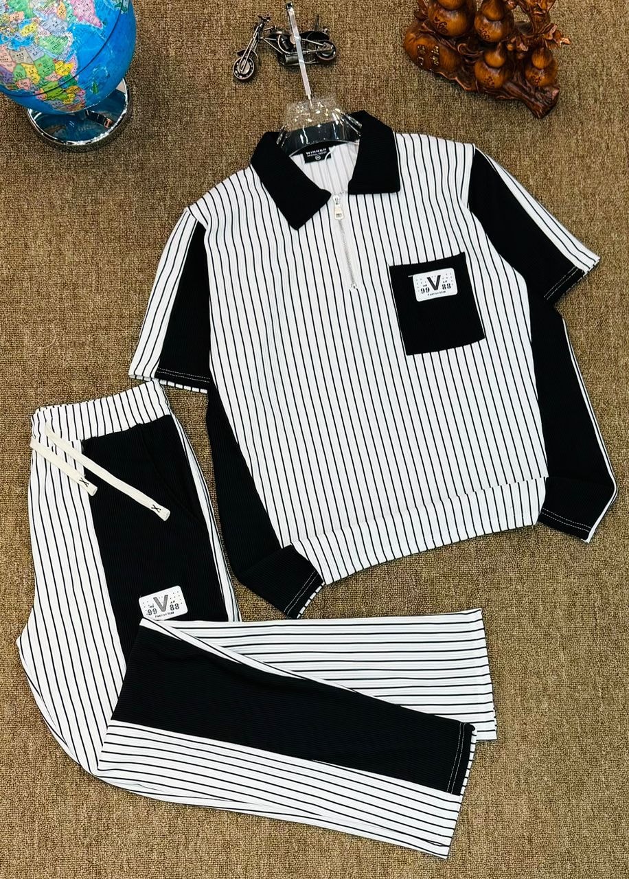 Black panel striped ribbed polo and jogger two-piece set.