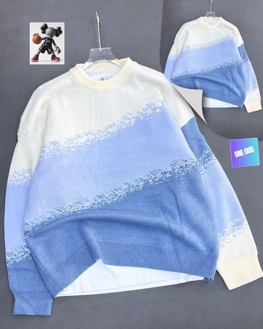 White to blue ombre gradient knit sweatshirt on hanger with back inset.