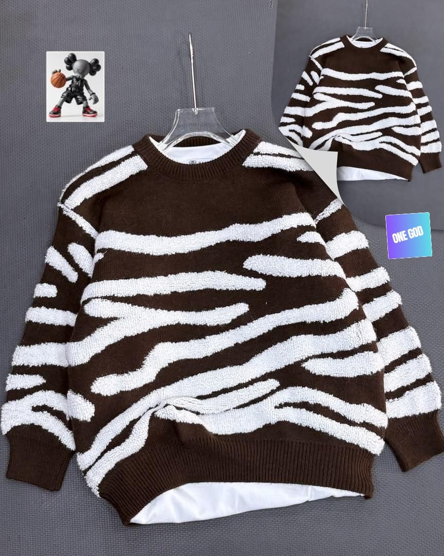 Brown base zebra stripe fuzzy knit sweatshirt on hanger with inset back view.