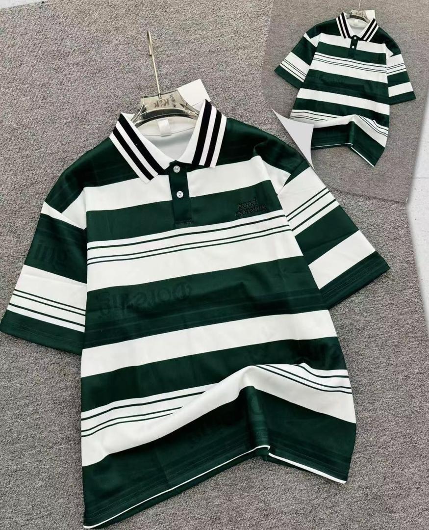 Green and white striped polo shirt on hanger with inset view.